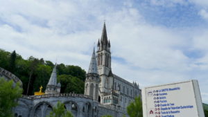 Front view of the Sanctuary viewed from the river level at Lourdes, (which is on the same plain as the grotto)