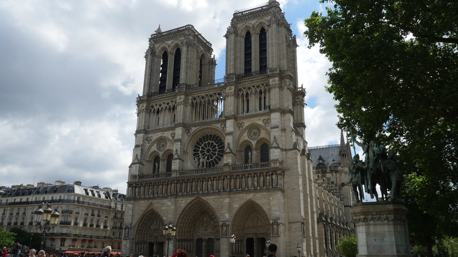 Main Entrance - Notre-Dame Cathedral; Paris, France- May 2017 note right side is section destroyed