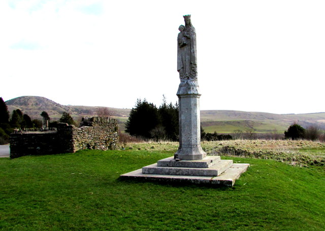 Photo of Statue with partial wall from ruins of Our Lady of Penrhys
