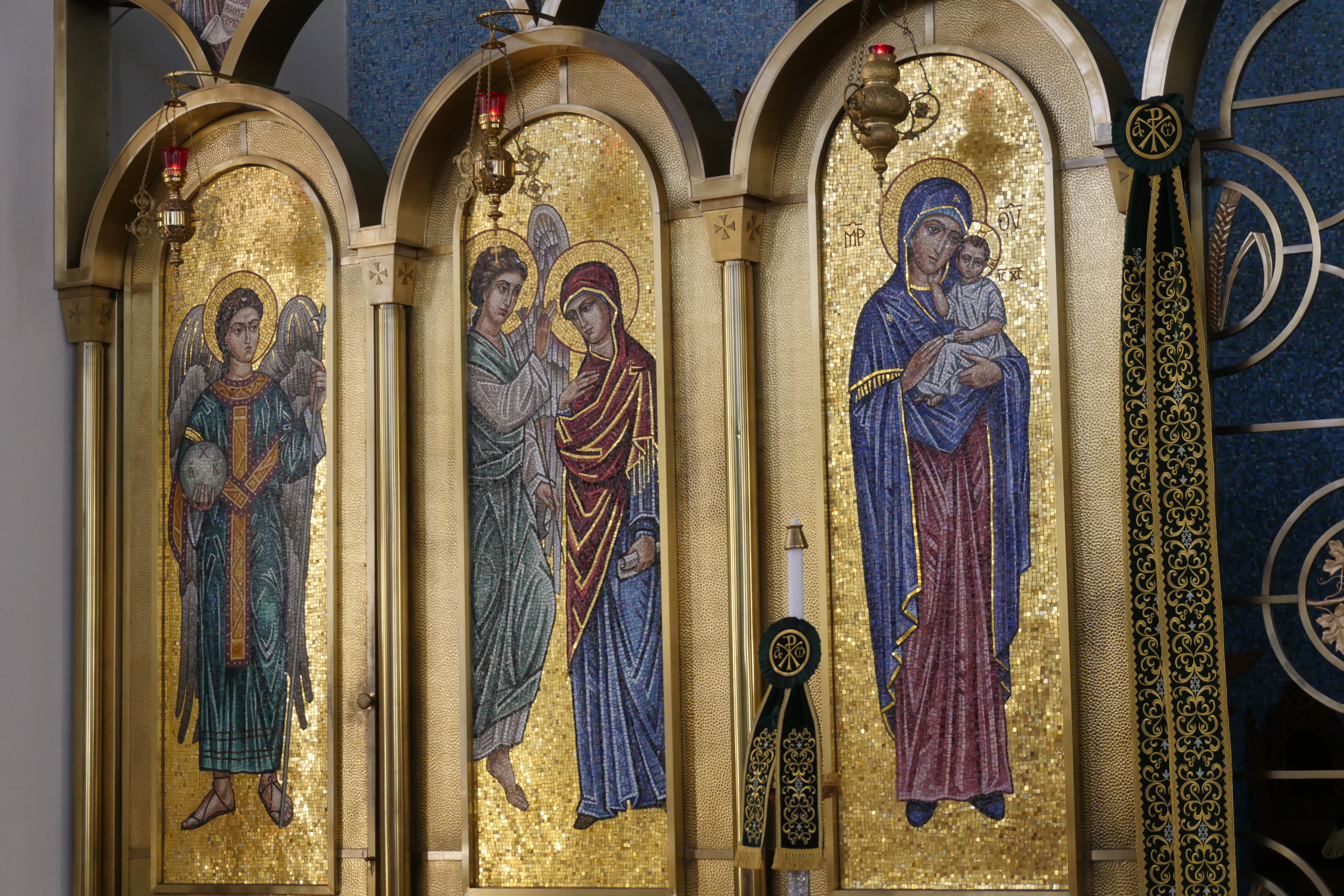 Photo with an icon of the Archangel Gabriel (far left) Annunciation of the Virgin Mary (center) and The Madonna with Baby Jesus (right) on the Icon screen at Annunciation Greek Orthodox Cathedral, Atlanta, GA