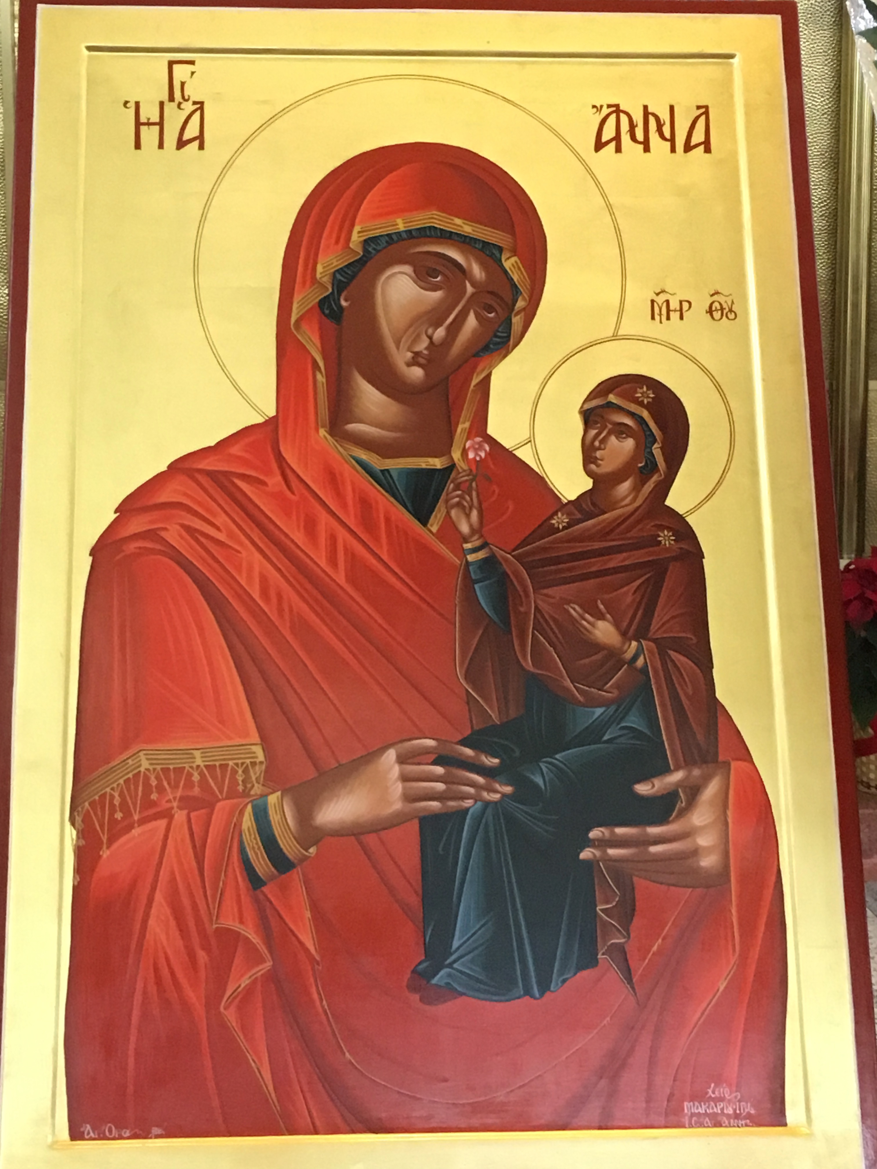 Photo of an Icon of The Nativity of the Virgin Mary, who sits on the lap of her mother, St Anna (St Ann)