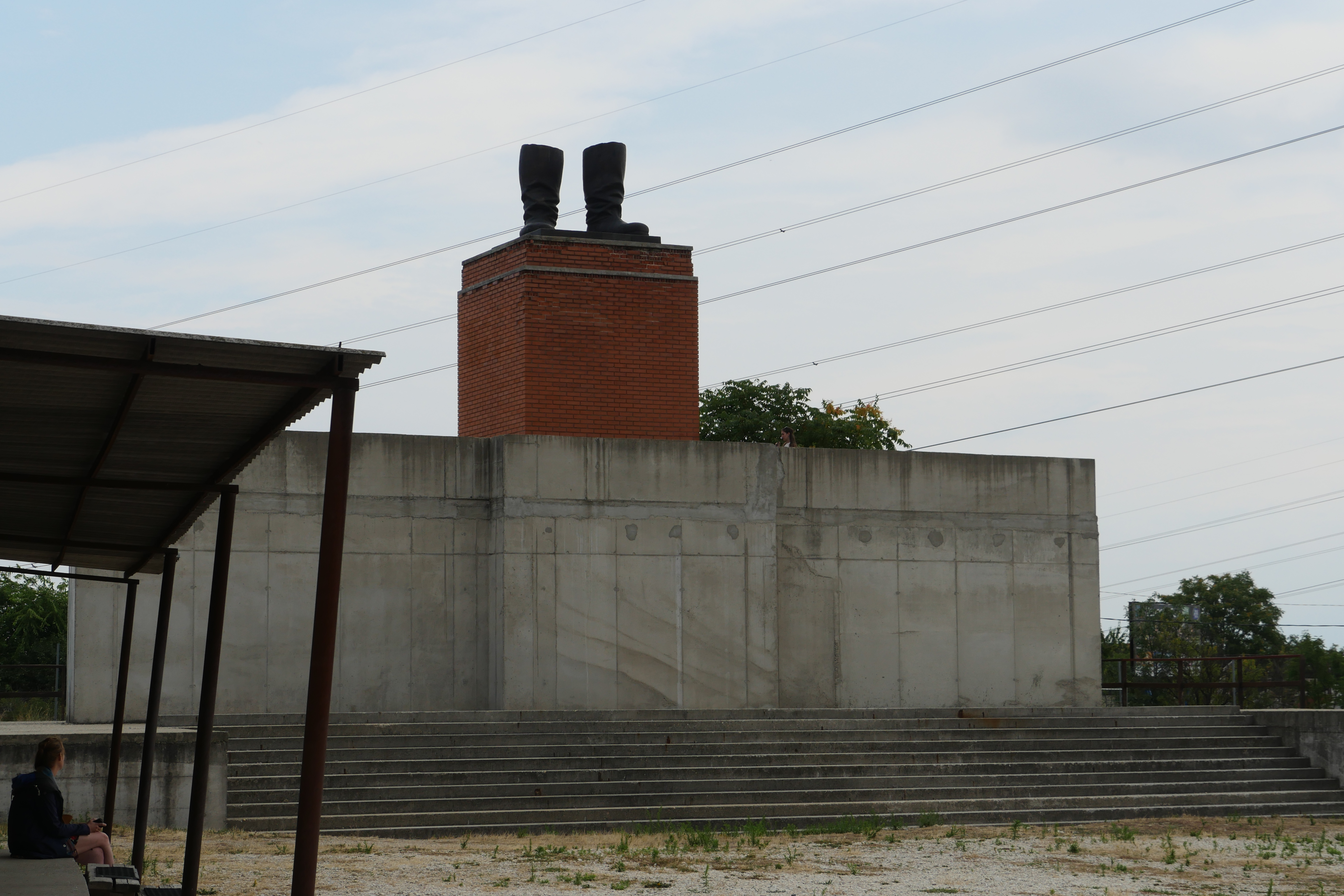 Photo of Stalin's boots on huge grandstand at Memento Park, Hungary