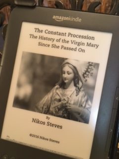 Photo of a Kindle with the cover of my book, The Constant Procession on it. The second image in this galley is a table of contents on an Amazon Kindle with the title and byline for my book on it.
