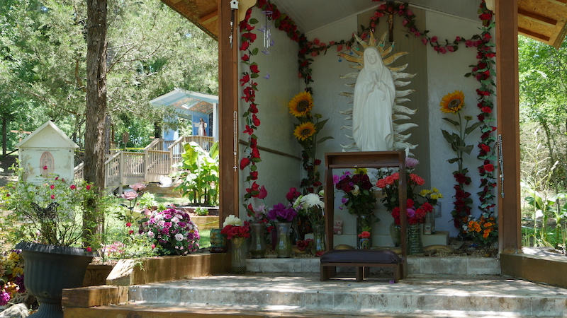 Photo of several of the memorials to the Virgin Mary in the woods at Our Mother's Children in Conyers, GA
