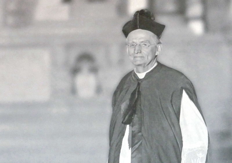 Old black and white photo of "Father Baker"
