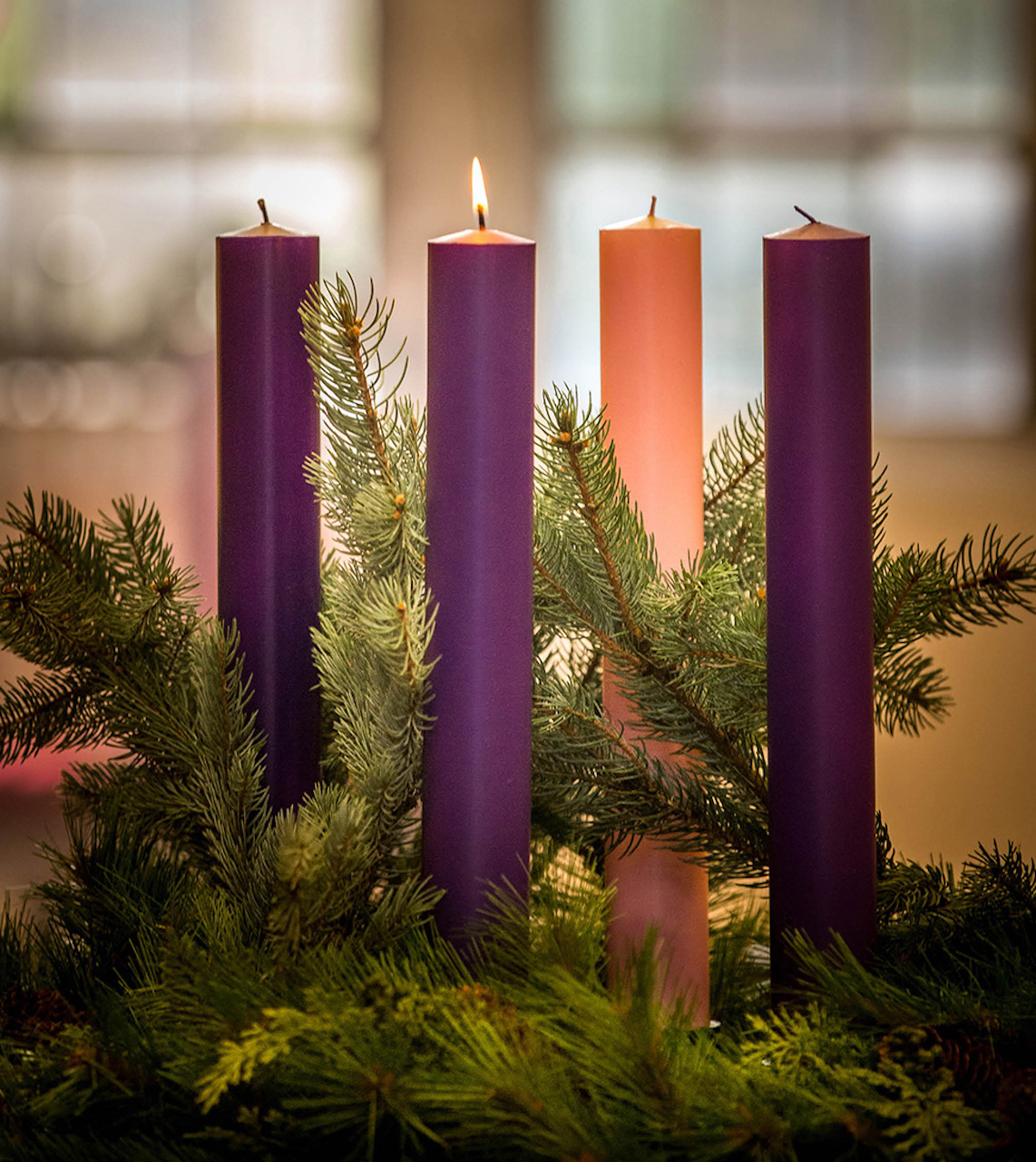 1st candle of Advent Wreath is glowing