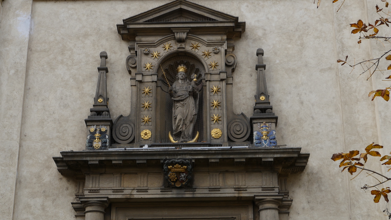 Close up of the entrance to Our Lady Victorious church in Prague