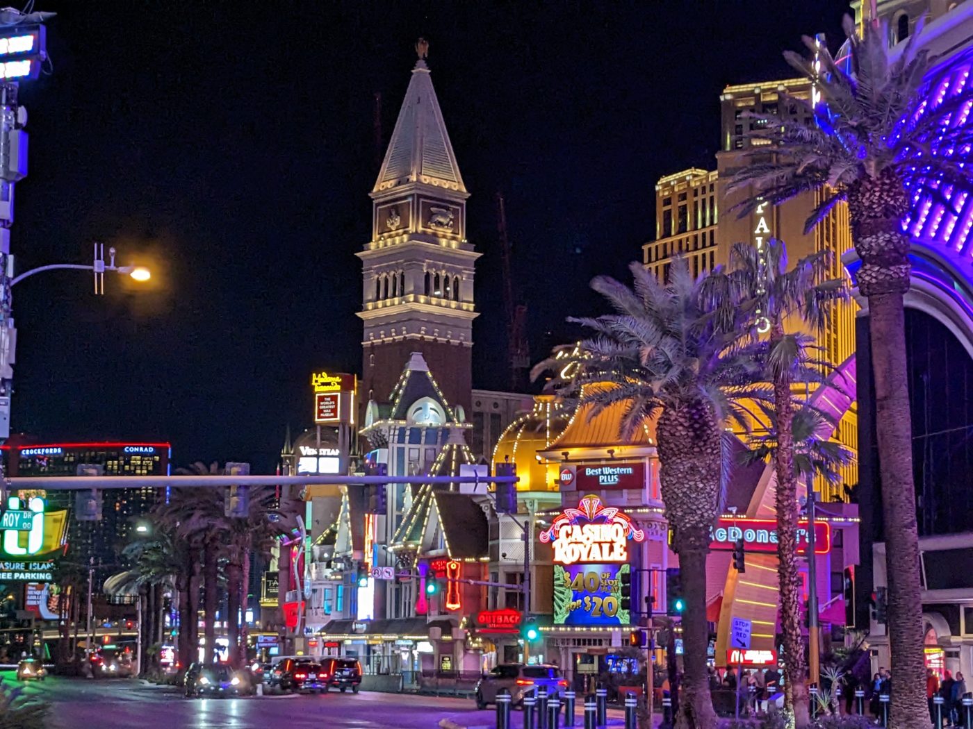 Photo of Las Vegas strip taken at night in February 2023 that includes the Venetian hotel's tower.