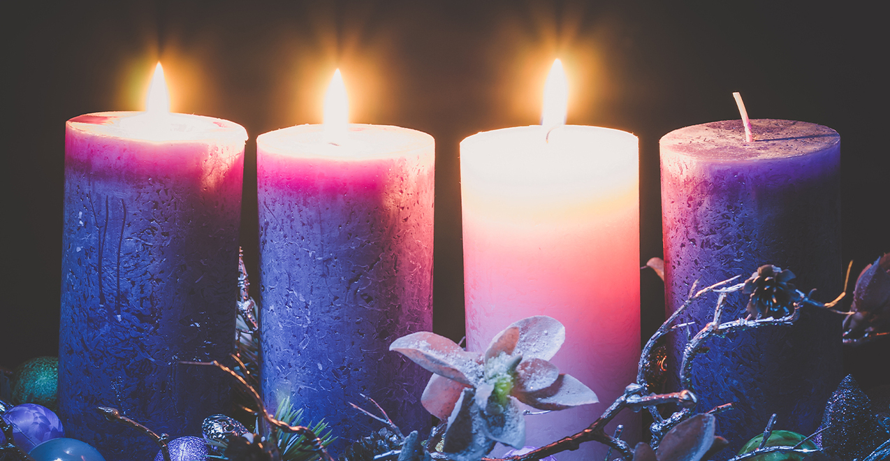 4 advent candles with 3 lit.