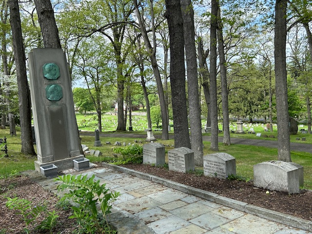 Photograph of the monument and burial marker for Mark Twain and family in Elmira, NY